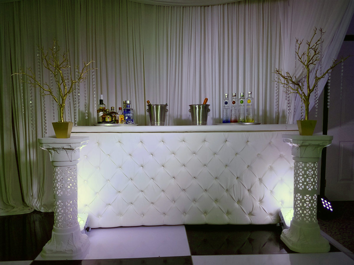 white tufted bar rentals