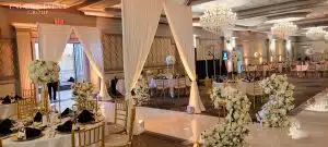 champagne uplights flower garland pillars min scaled champagne uplights flower garland pillars min scaled
