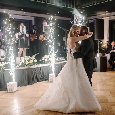 Kathy Davis enjoying first dance with fireworks at wedding