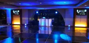 Professional DJ setup with lighting and dance floor Professional DJ setup with lighting and dance floor