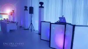 Modern DJ booth setup with clean facade and lighting Modern DJ booth setup with clean facade and lighting