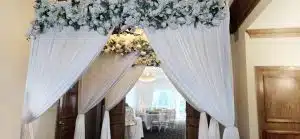 flower garlands on draping min scaled flower garlands on draping min scaled