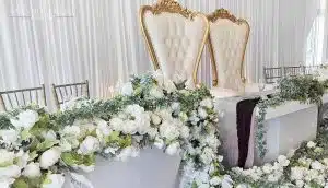 headtable throne chairs flower garlands min scaled headtable throne chairs flower garlands min scaled