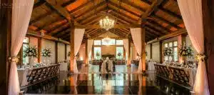 black dance floor barn pillar draping min scaled black dance floor barn pillar draping min scaled