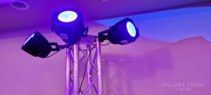 black_lights_mounted_to_trussing-min