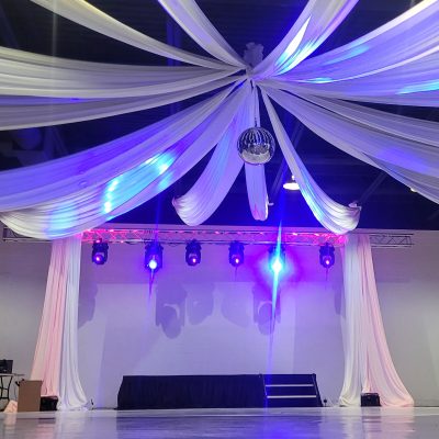 Hydraulic concert truss setup for City of Lights wedding lighting