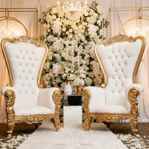 gold_throne_chair_setup_at_wedding-min
