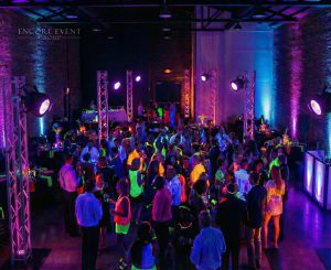 neon_lights_mounted_on_truss_for_company_glow_party-min