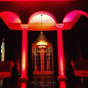 red uplights black drapes halloween party min red uplights black drapes halloween party min