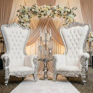 silver_throne_chairs_draping_backdrop_for_wedding-min