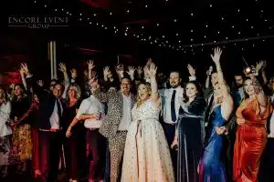Wedding DJ group photo with full dance floor Wedding DJ group photo with full dance floor