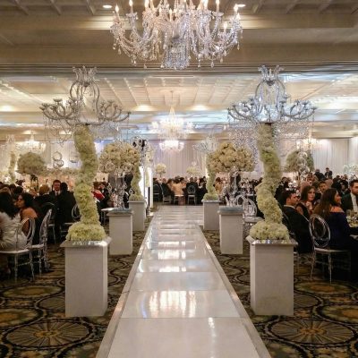 White modular dance floor used as runway at Kentuckiana wedding