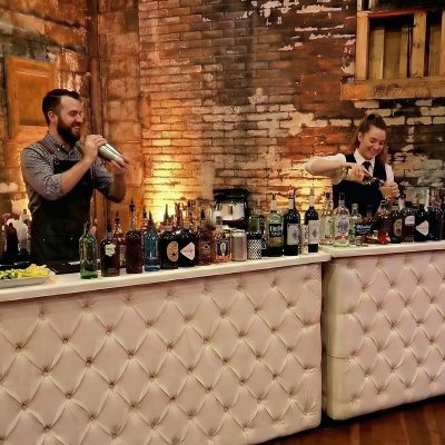 White tufted bar rental in Louisville wedding venue White tufted bar rental in Louisville wedding venue