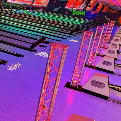 Custom logo gobo lighting projected on dance floor at album release party