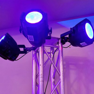 UV glow lights mounted on truss with flexible event lighting setup UV glow lights mounted on truss with flexible event lighting setup