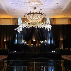 Black dance floor with chuppah draping Black dance floor with chuppah draping